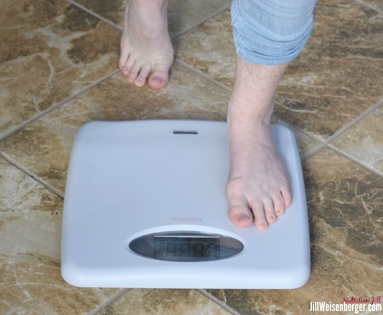 stepping on scale for weight loss