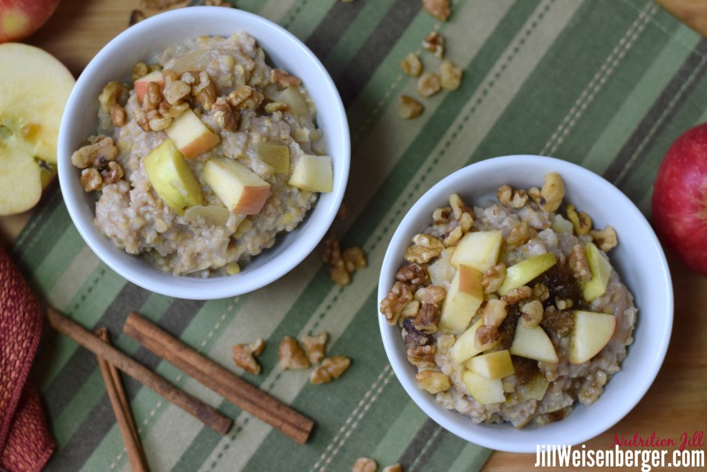heart healthy breakfast of oats and apples with walnuts and cinnamon