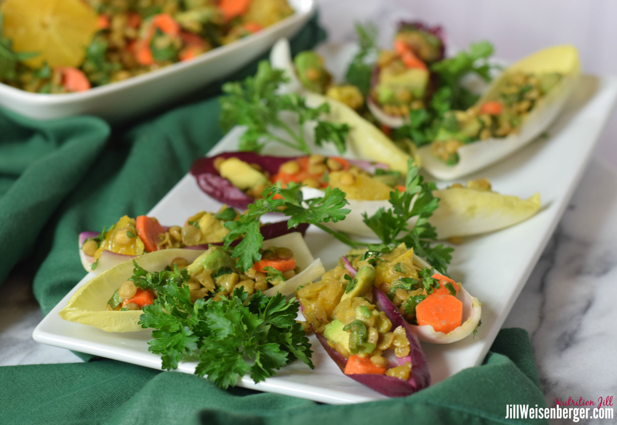 healthy lentil salad in endive leaves