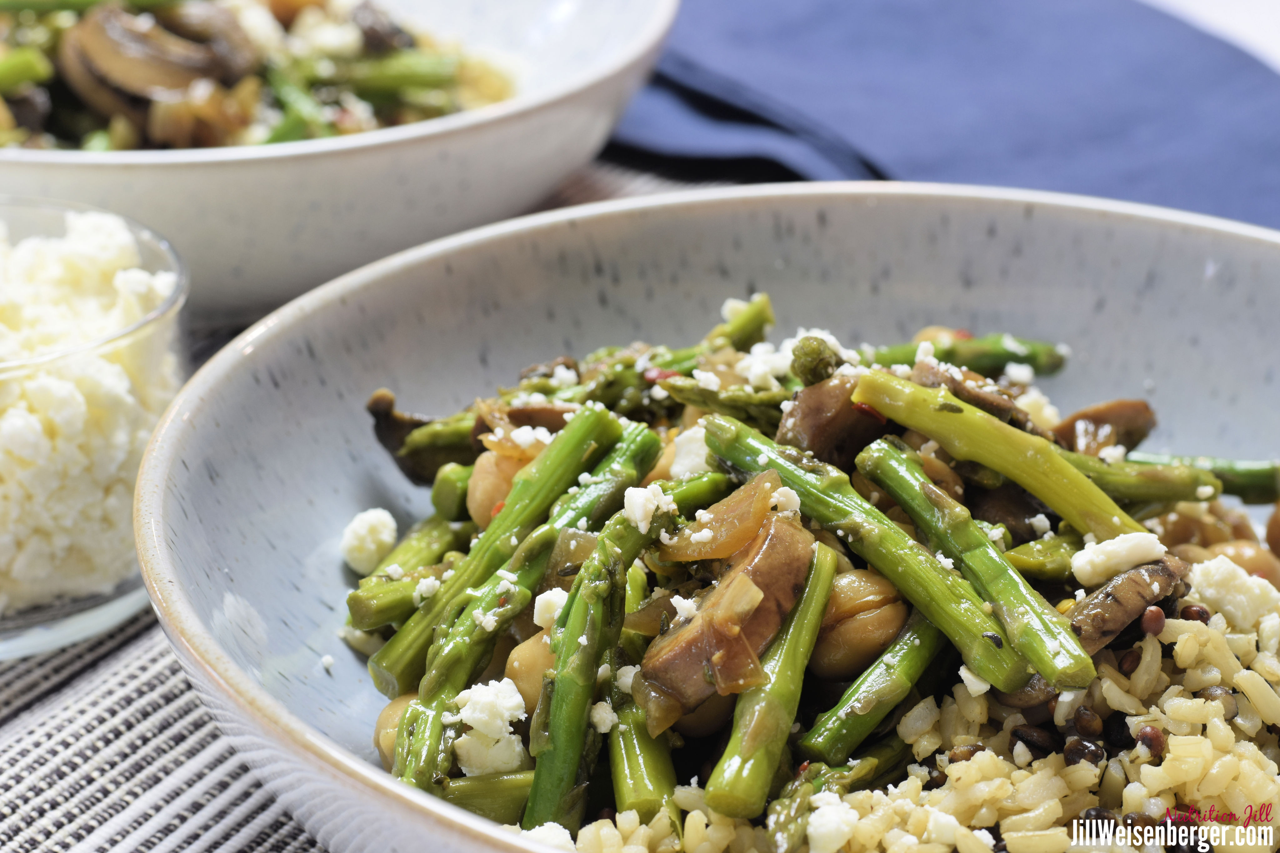 Bowl with chickpeas, asparagus, mushrooms and feta cheese