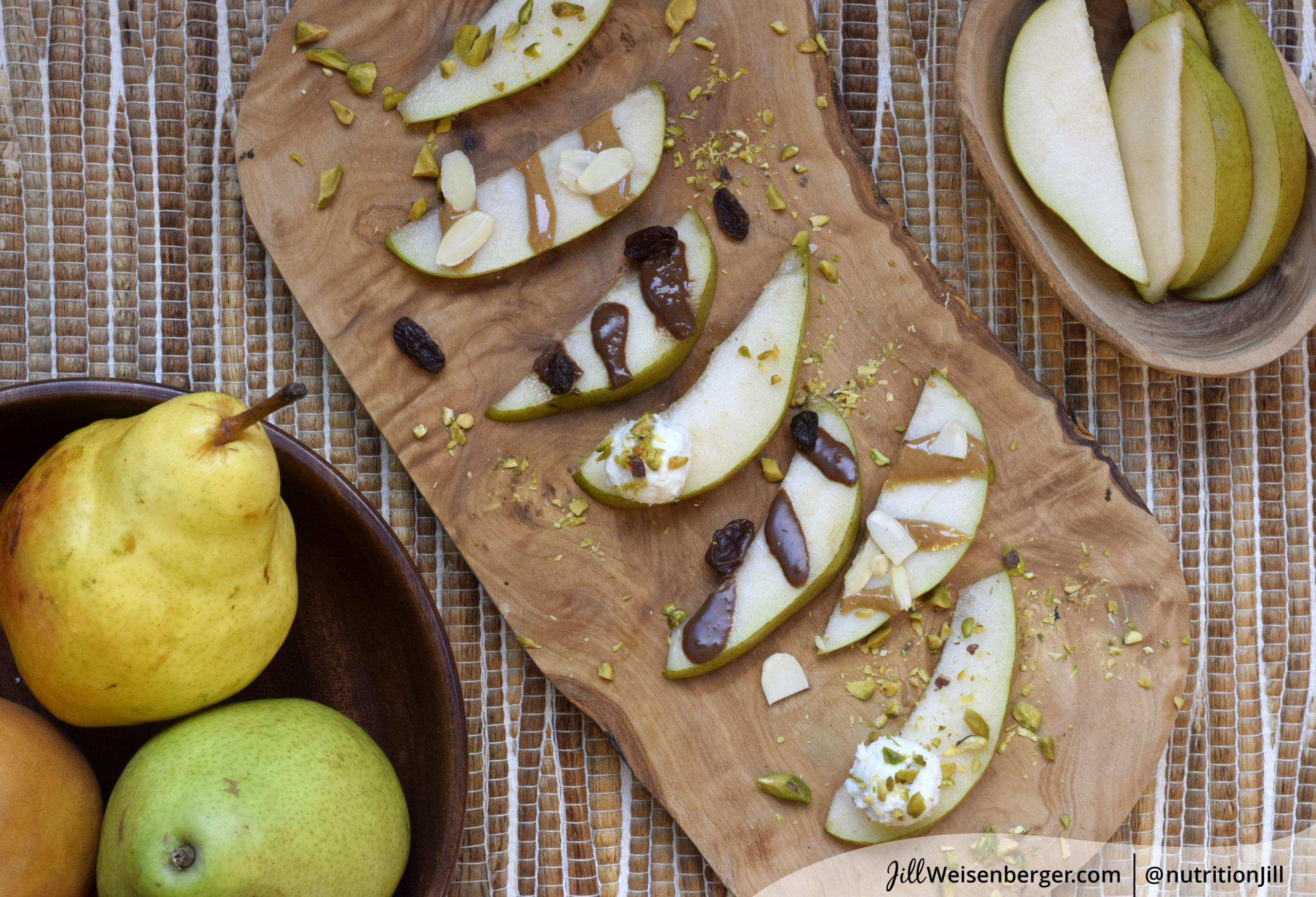 Sliced pear snacks on a wooden board