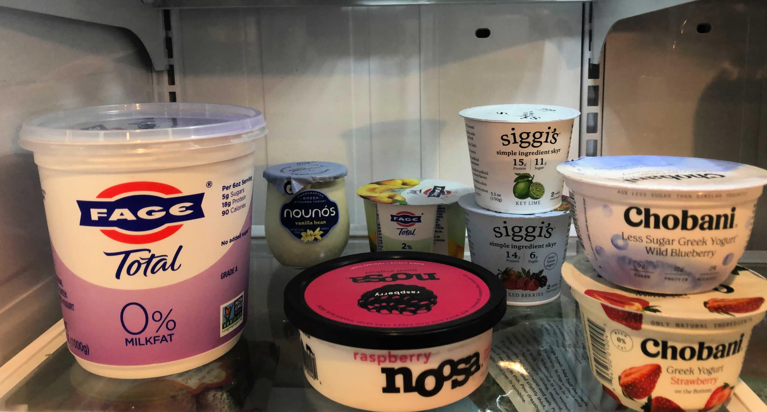 several types of yogurt in the refrigerator