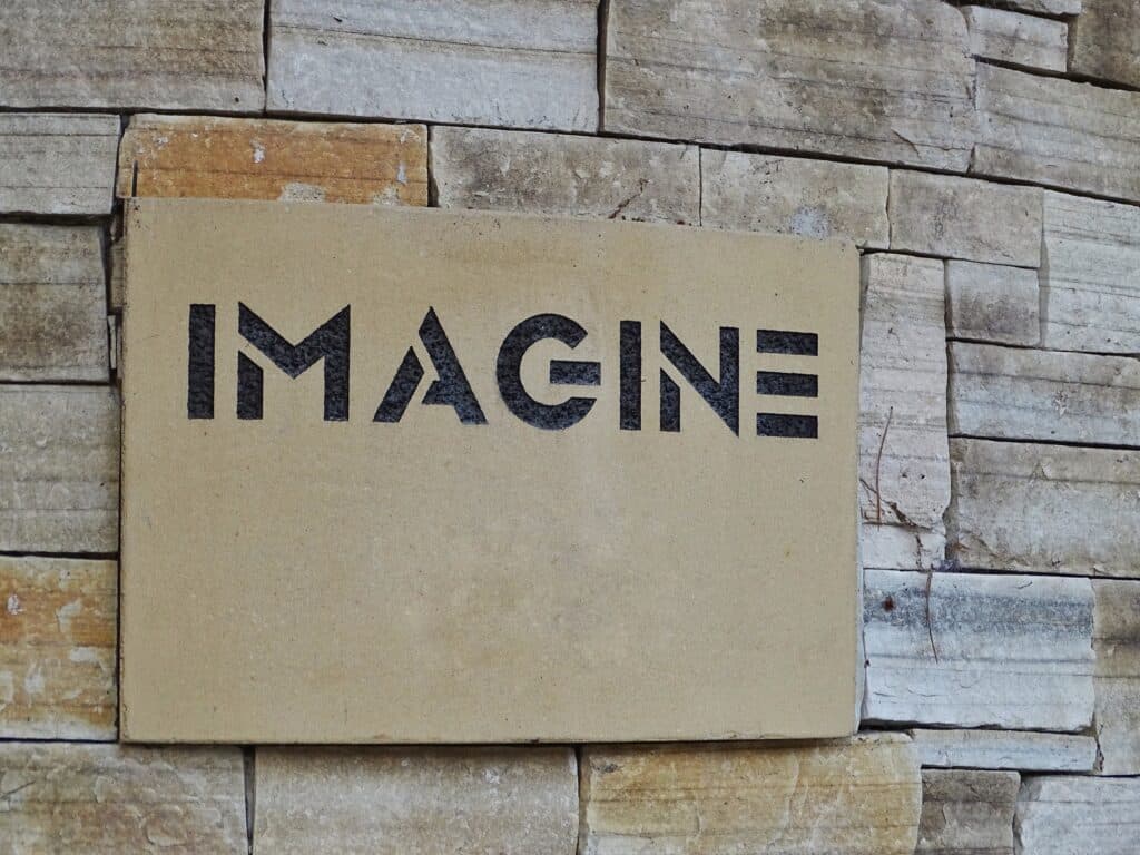 sign says IMAGINE